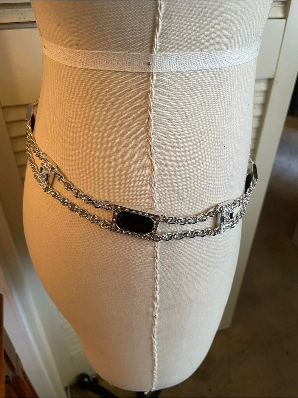 St John’s silver toned belt